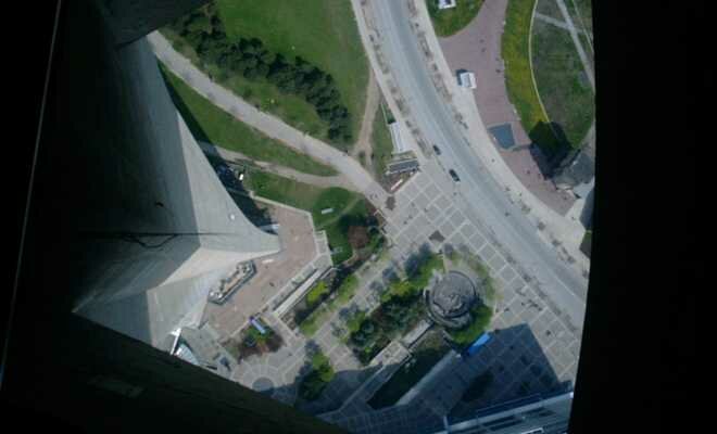 Through the CN Tower's glass floor Photo - CN Tower, Toronto, Ontario 